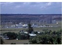 ASA compound in foreground & 6922nd Security Wing circularly disposed antenna array in background