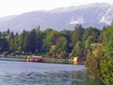 Pletna boat ride across Lake Bled with Julian Alps in background
