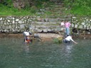 Washing clothes in River