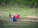 Washing Motor Bike in River