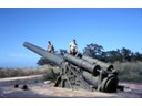 Howard on left with Corregidor's Largest Gun (54 tons 12 inch 29,000 yards range)