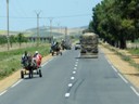 Back road Traffic with horses & lots of over loaded Trucks
