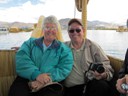 Riding in large totora reed boat (Pat and Howard)